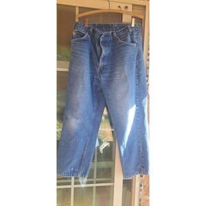 Vintage early 90's Levi’s 557 Men’s Jeans 35x30 Made in USA Relaxed Fit Orange T
